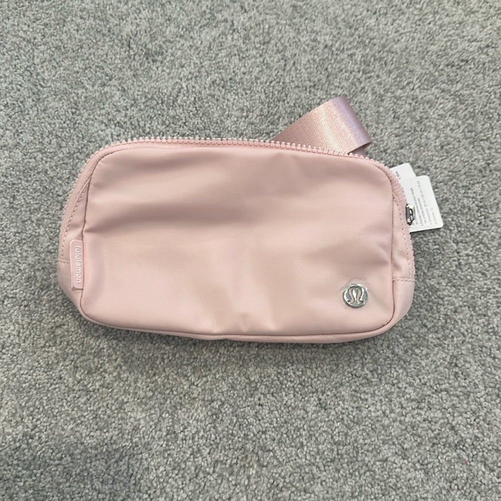 Brand new light pink Lululemon Belt bag